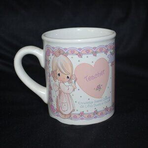 Pre-owned never used Vintage Precious Moments Teacher coffee Mug.